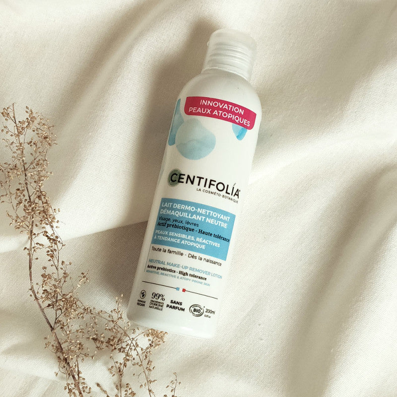 Centifolia Neutral Makeup Remover Lotion (Wholesale) on white fabric with a small plant beside it
